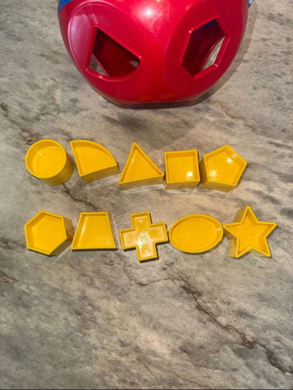 Tupperware Red Shape Sorter Ball with Yellow Geometric Pieces